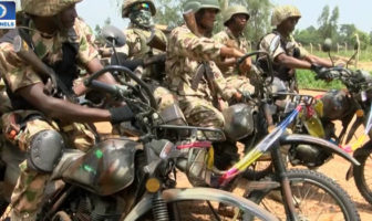 Civil-military cooperation: Operation Safe Haven personnel clean Jos streets