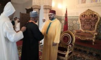 Nigeria’s Ambassador to Morocco, Mr. Baba Garba (m) being congratulated by King Mohammed VI, after conferment with Wissam Al Alaoui at the Royal Palace in Rabat, Morocco on Sunday.